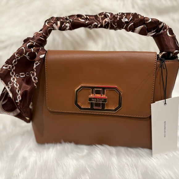 Nicole Miller Handbags - NWT Nicole Miller Designer Handbag with Ribbon Detail
